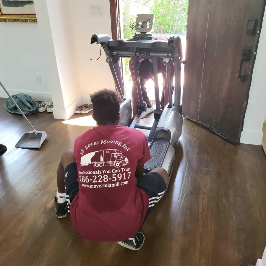 SF Local mover disassembling an elliptical machine